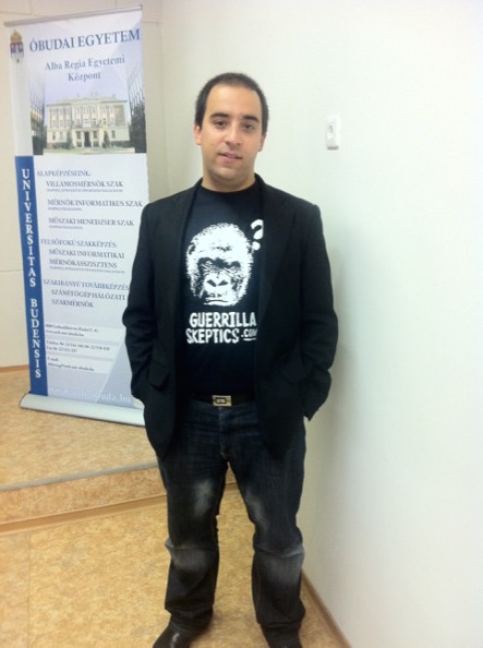 author wearing Guerrilla Skepticism on Wikipedia t-shirt